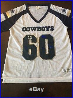 pink and white cowboys jersey