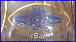Dallas Cowboy wine decanter from 1960. Featuring their first logo. And NFL logo
