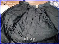 Vintage NFL Dallas Cowboys 2XL Coat made by Reebok. Blue Black Puffer Jacket